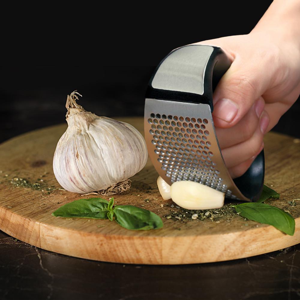CURVED GARLIC PRESS 11 X 5 X 7 CM EU Supplies